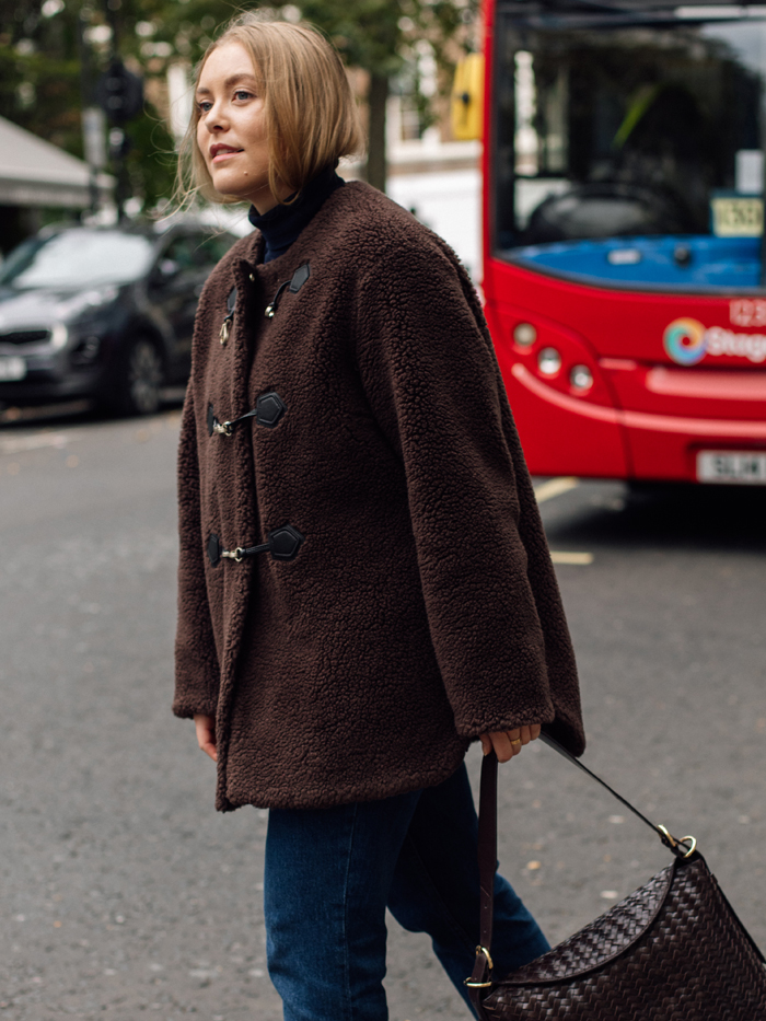 Who What Wear commerce writer Florrie Alexander wears M&S's faux shearling coat