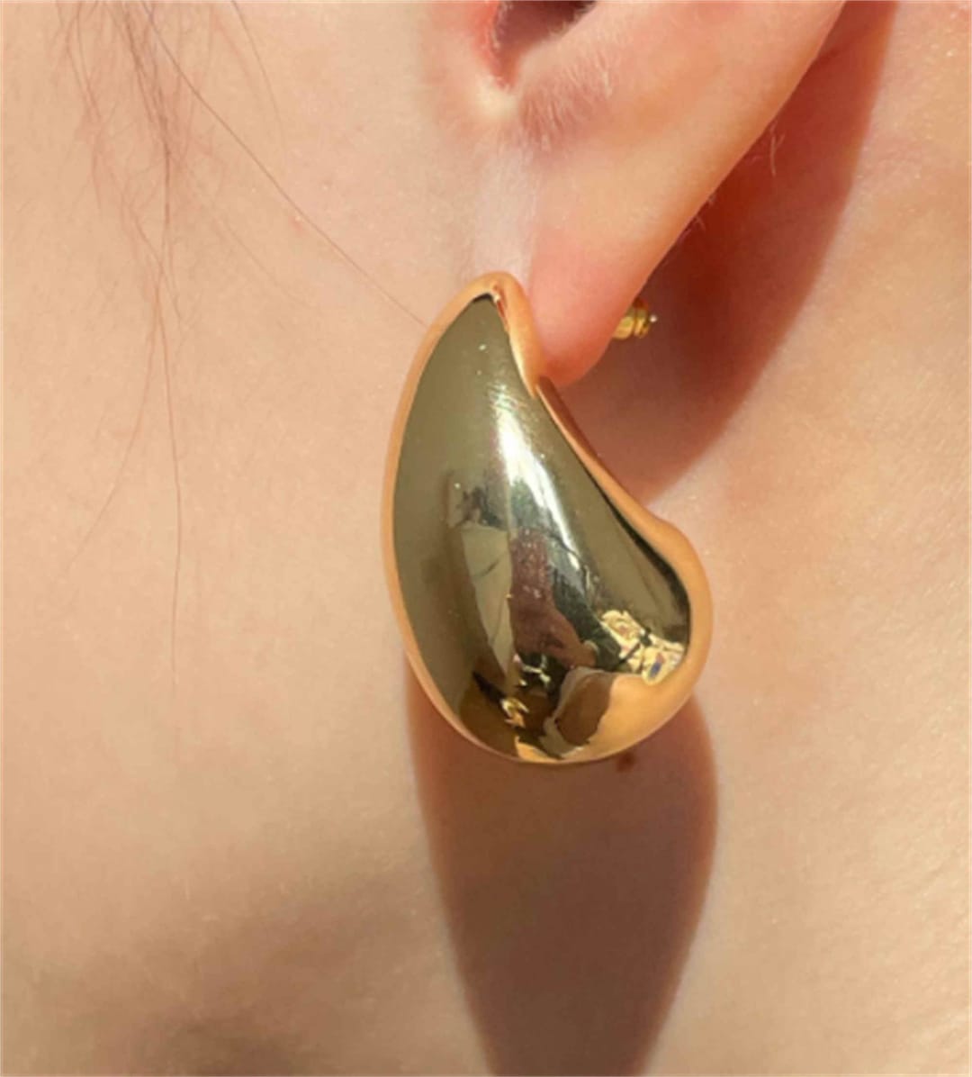 These $14  earrings look just like the $820 Bottega Veneta pair  celebrities love