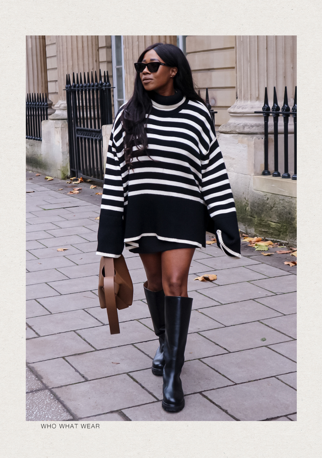 Influencer Lois Sterling styles a black mini skirt with a stripe jumper and knee boots