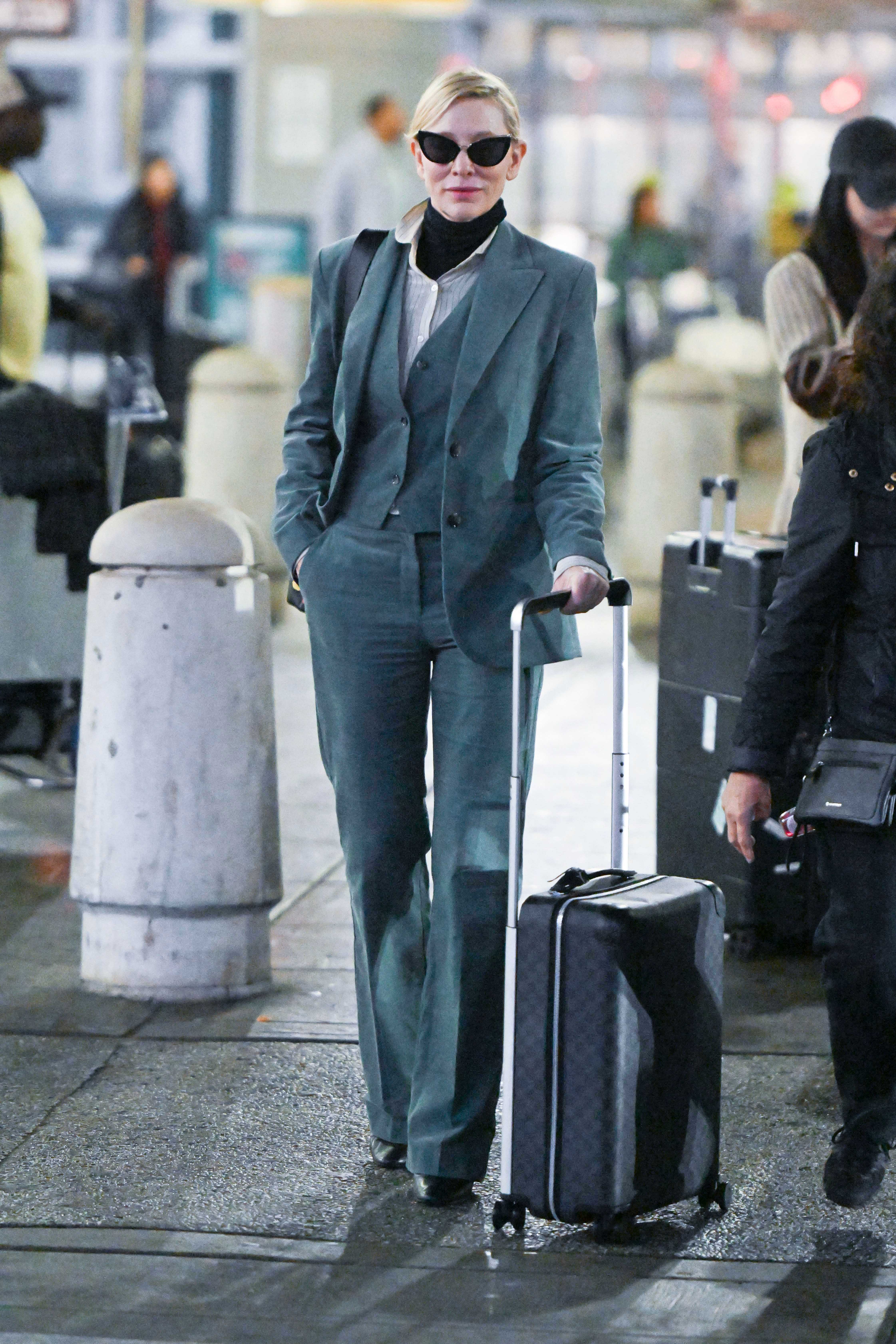 Cate Blanchett wearing Mango suit to the airport.
