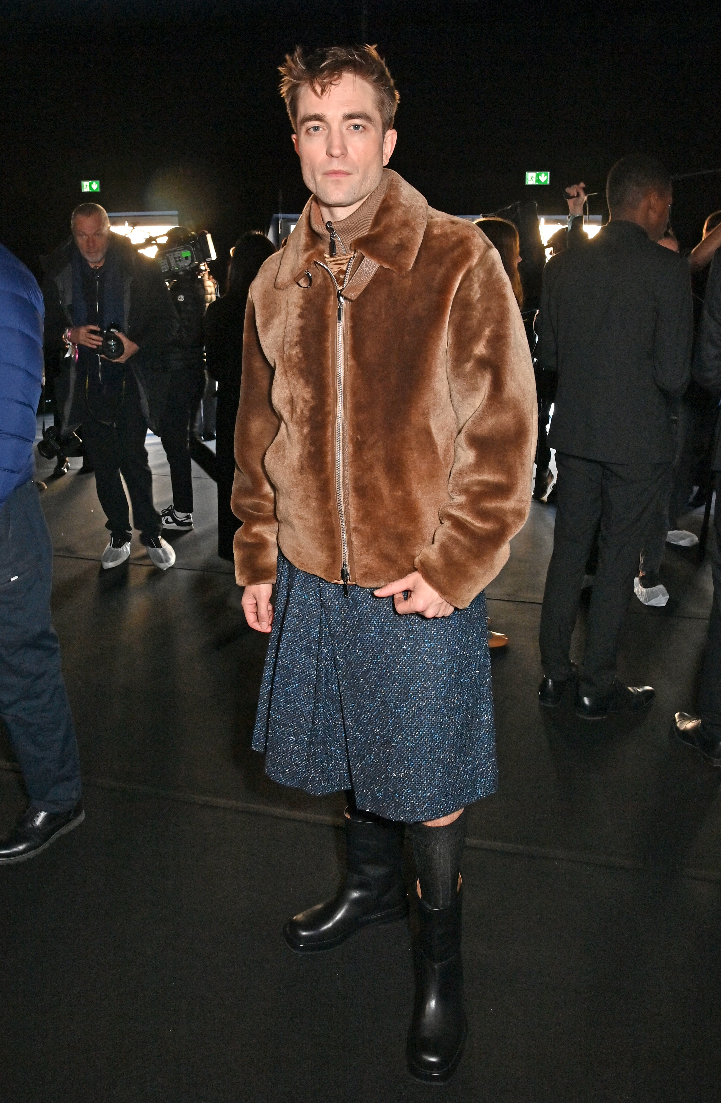 robert pattinson wearing a skirt to the dior show in paris