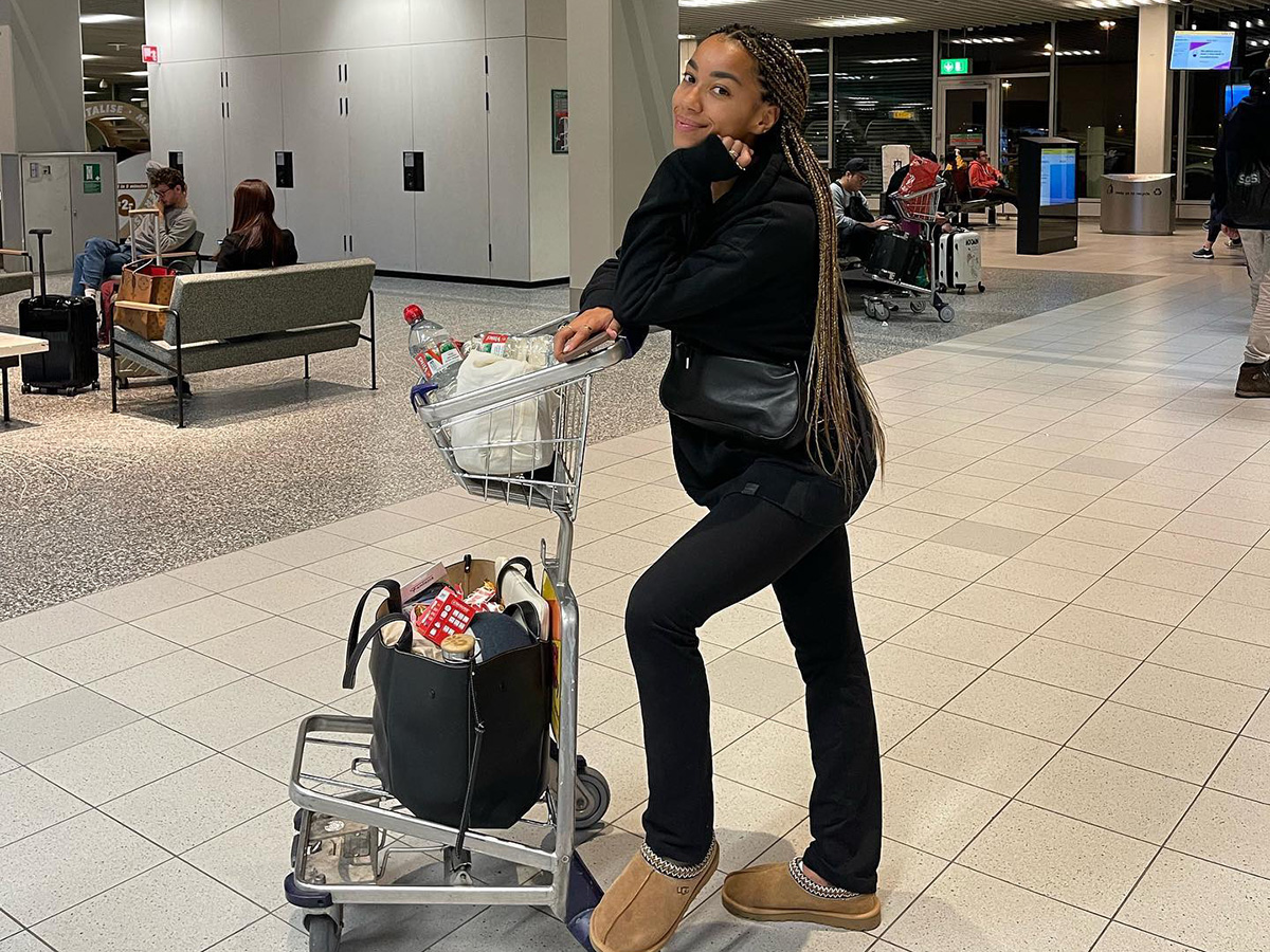 Girl at airport baggage claim