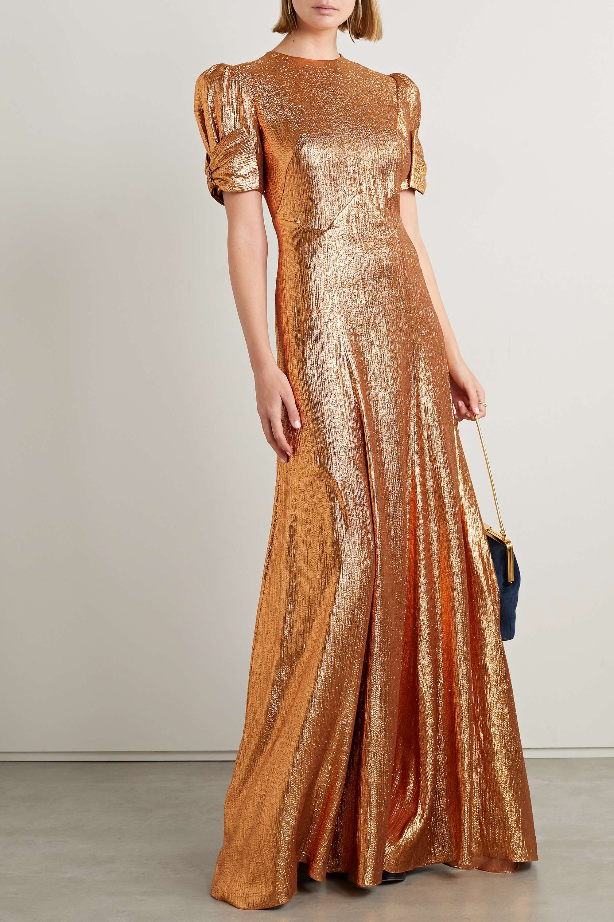 The American Bow-Detailed Wool-Blend Lamé Gown