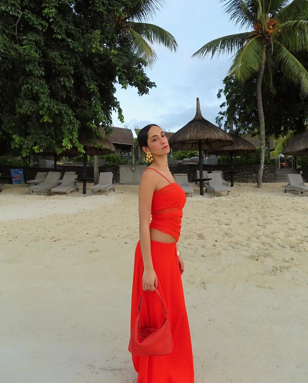 Summer Colour Trends: @emnitta wears a red halter top and skirt