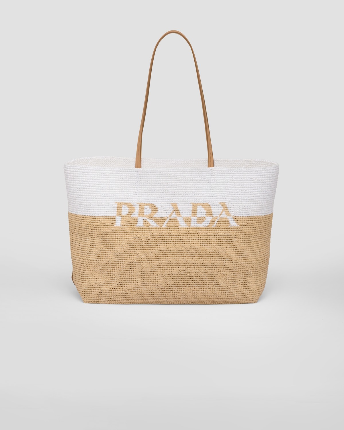 Gigi Hadid Turned a Prada Raffia Tote Into an Airport Bag | Who What ...
