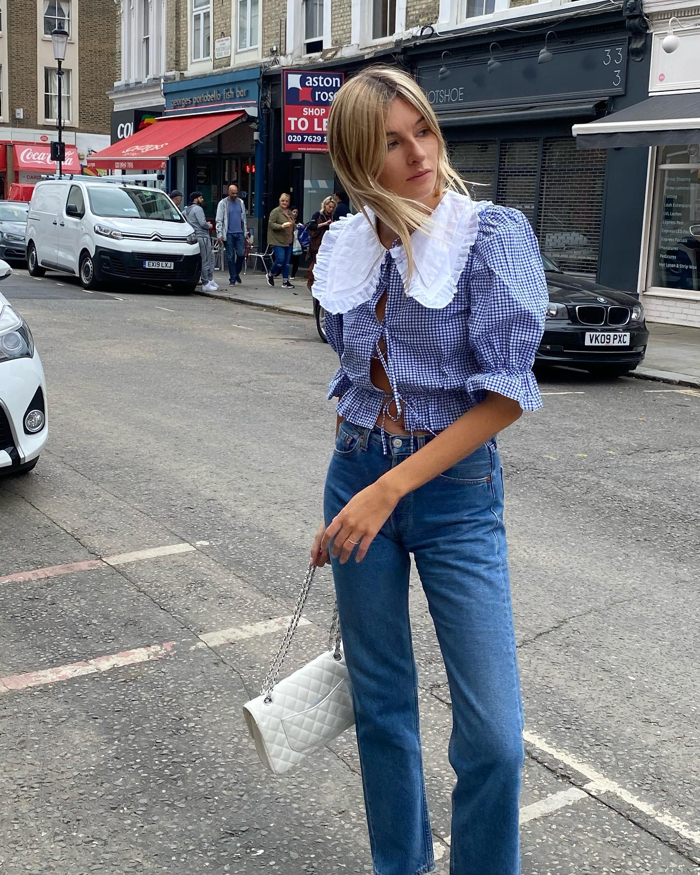 Camille Charriere 11 Stylish Ways to Wear Tie-Front Tops for Fall Pilgrim Collar Jeans