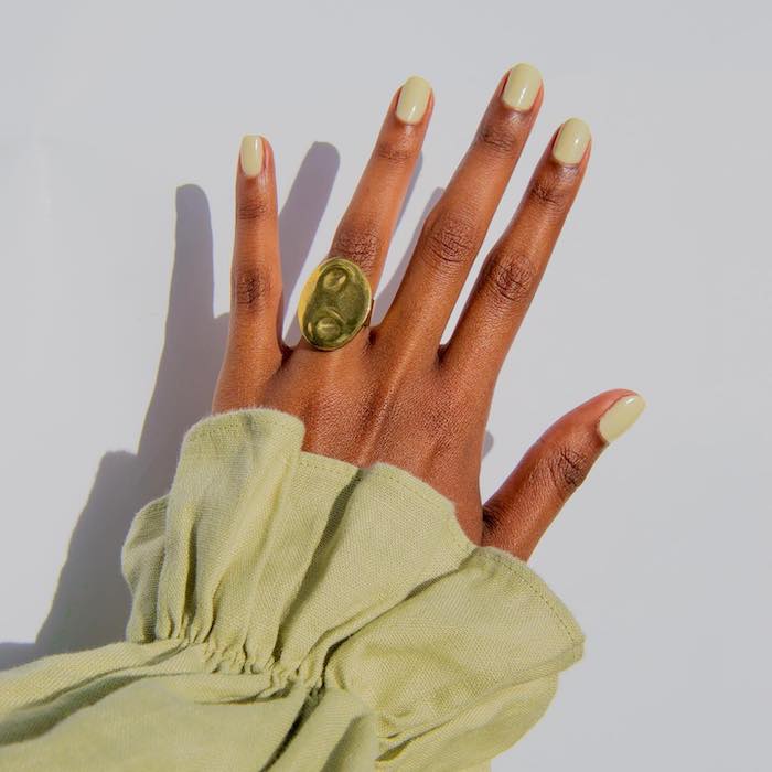 Olive green nail polish on short nails