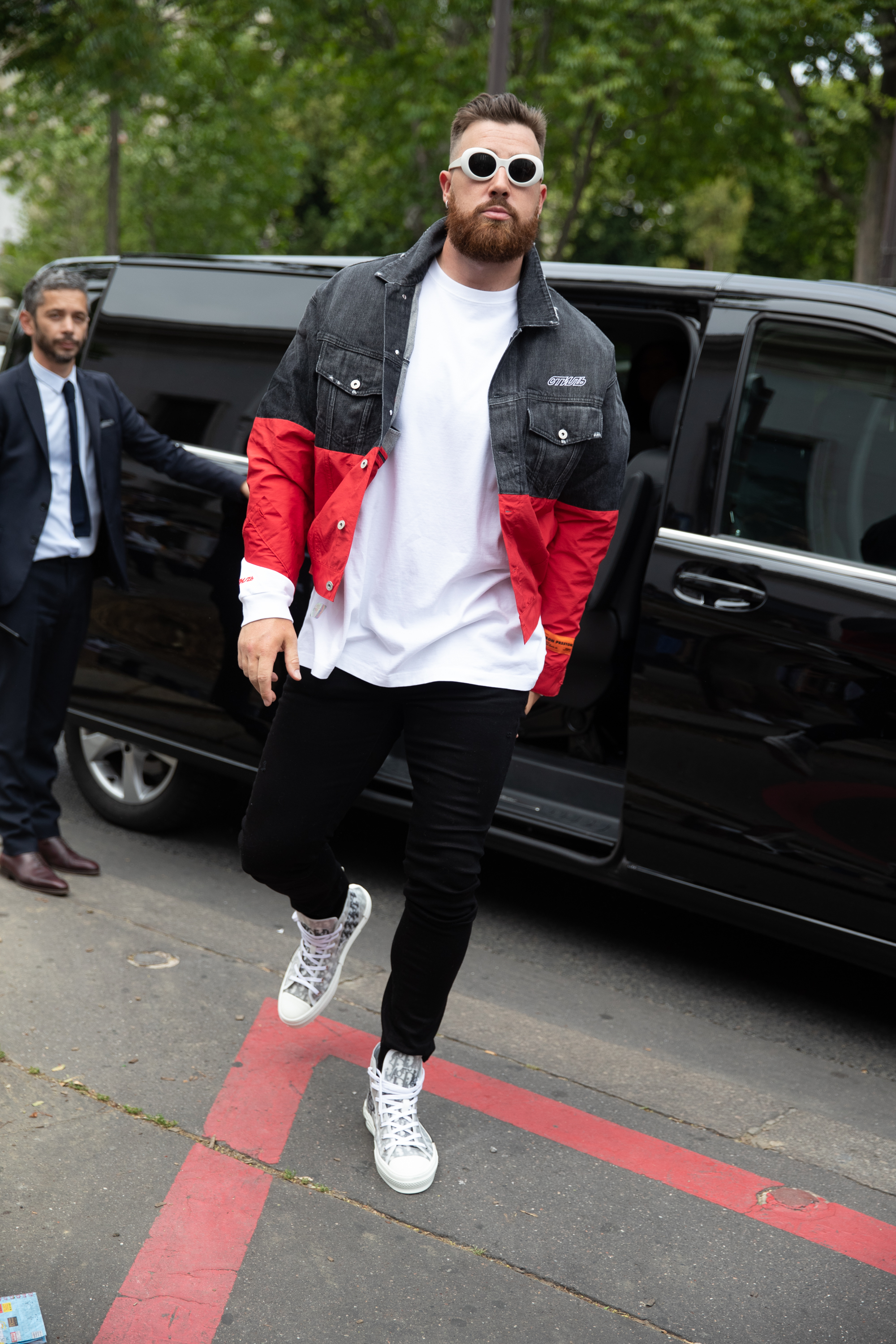 Travis Kelce's Style Evolution: Skinny Jeans, Dior Suit and More – WWD