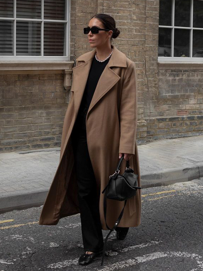 Jessica Skye wears a Marks & Spencer camel coat with black jeans