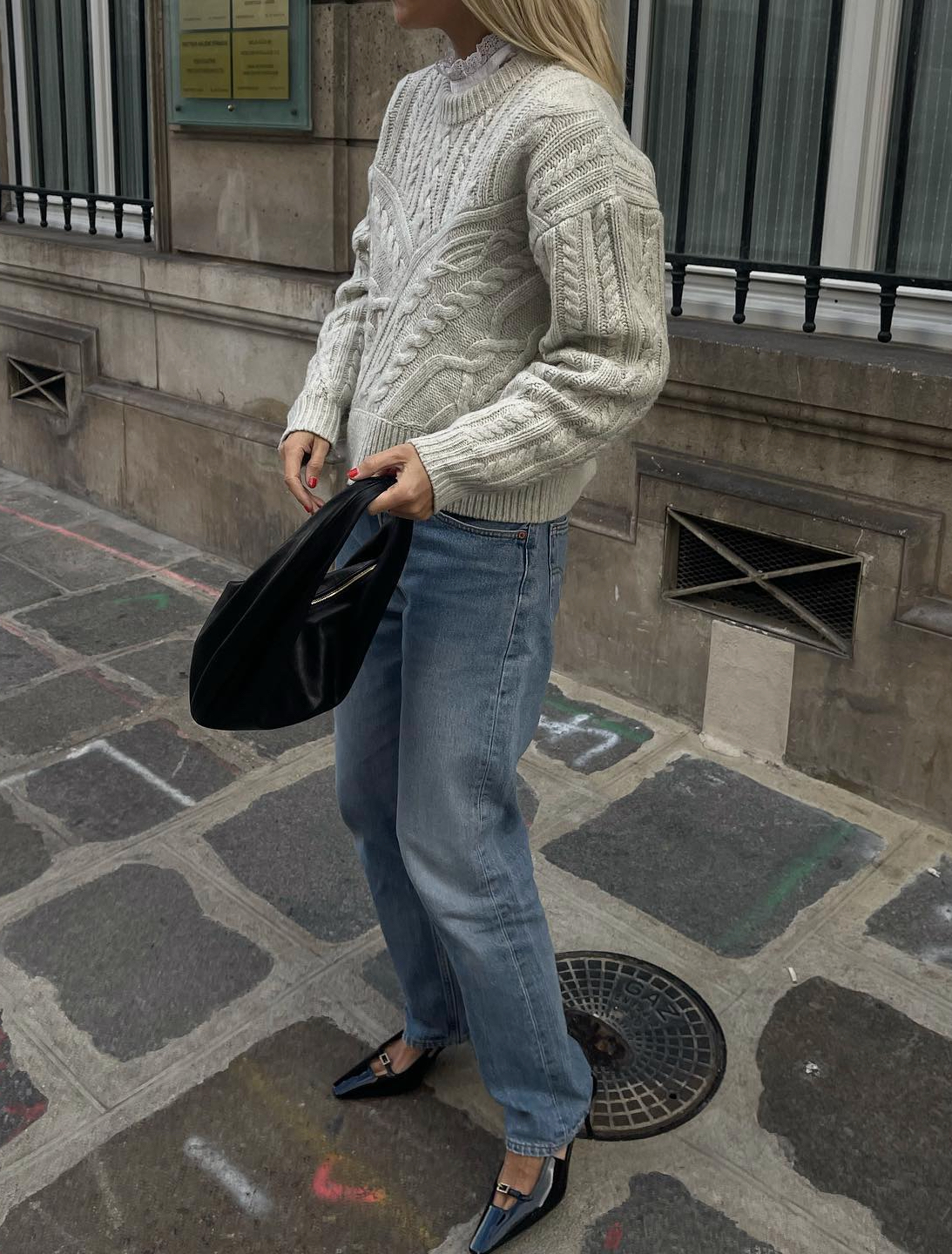 gray cable knit sweater and jeans outfit