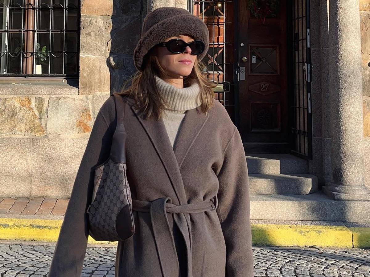 31 Chic Rich-Looking Pieces Worth Adding to Your Closet Johanna Lager Shearling Fur Hat Oversize Turtleneck Top Belted Coat Affordable Rich Girl  Finds Expensive Winter Outfit Idea
